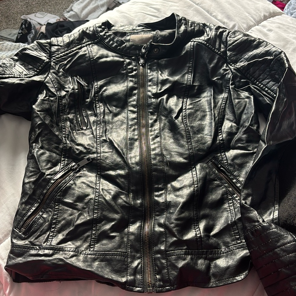 Black, detailed leather jacket